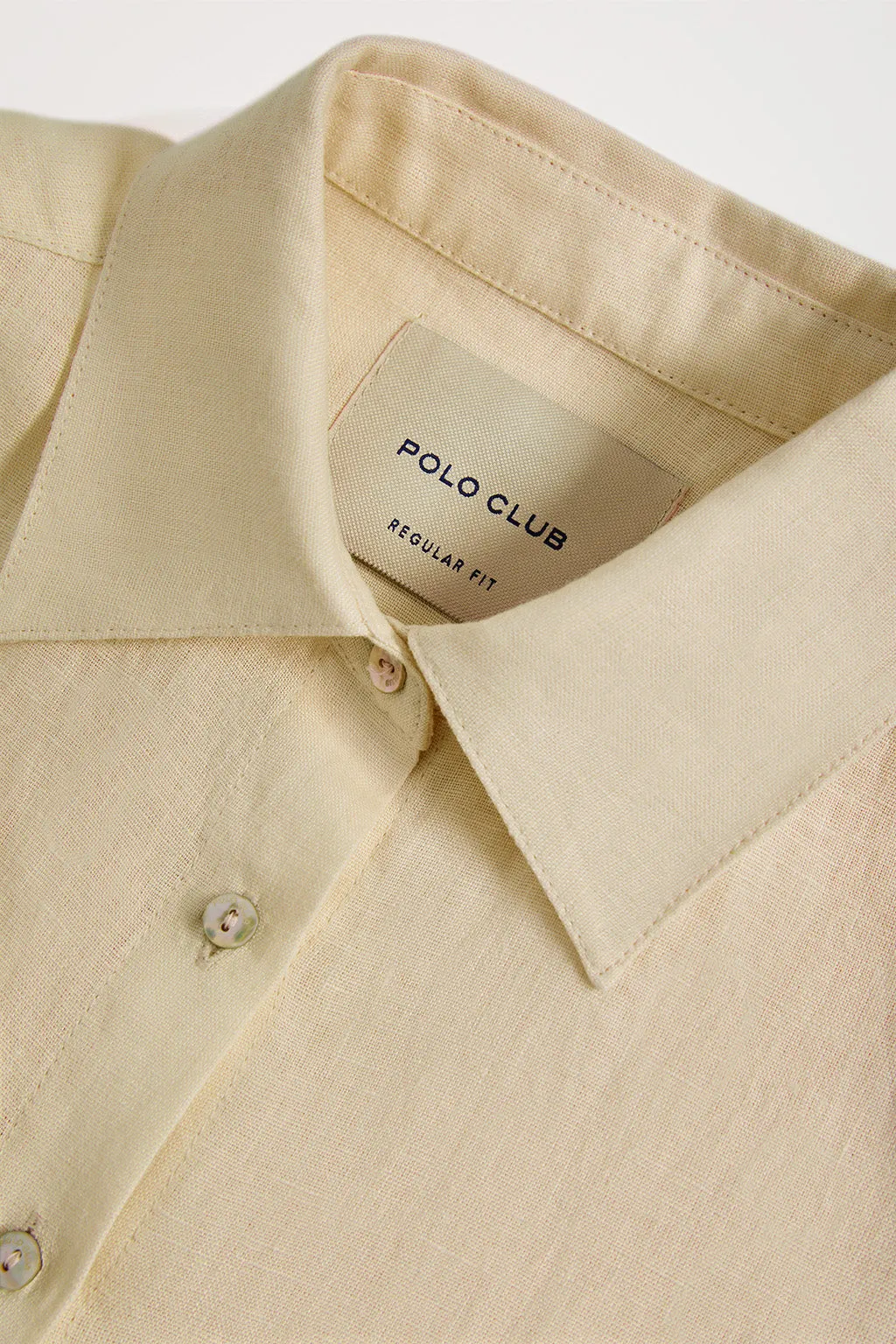 Camisa de lino beige con detalle bordado