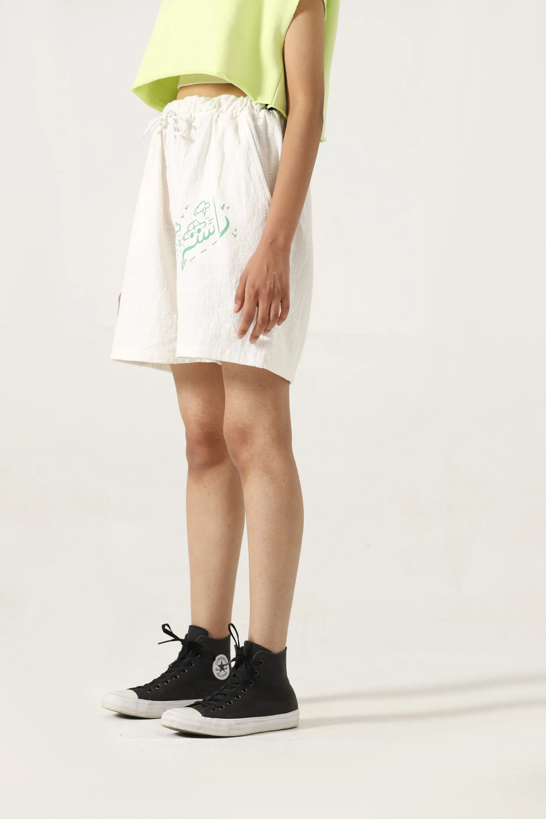 hand woven green logo shorts