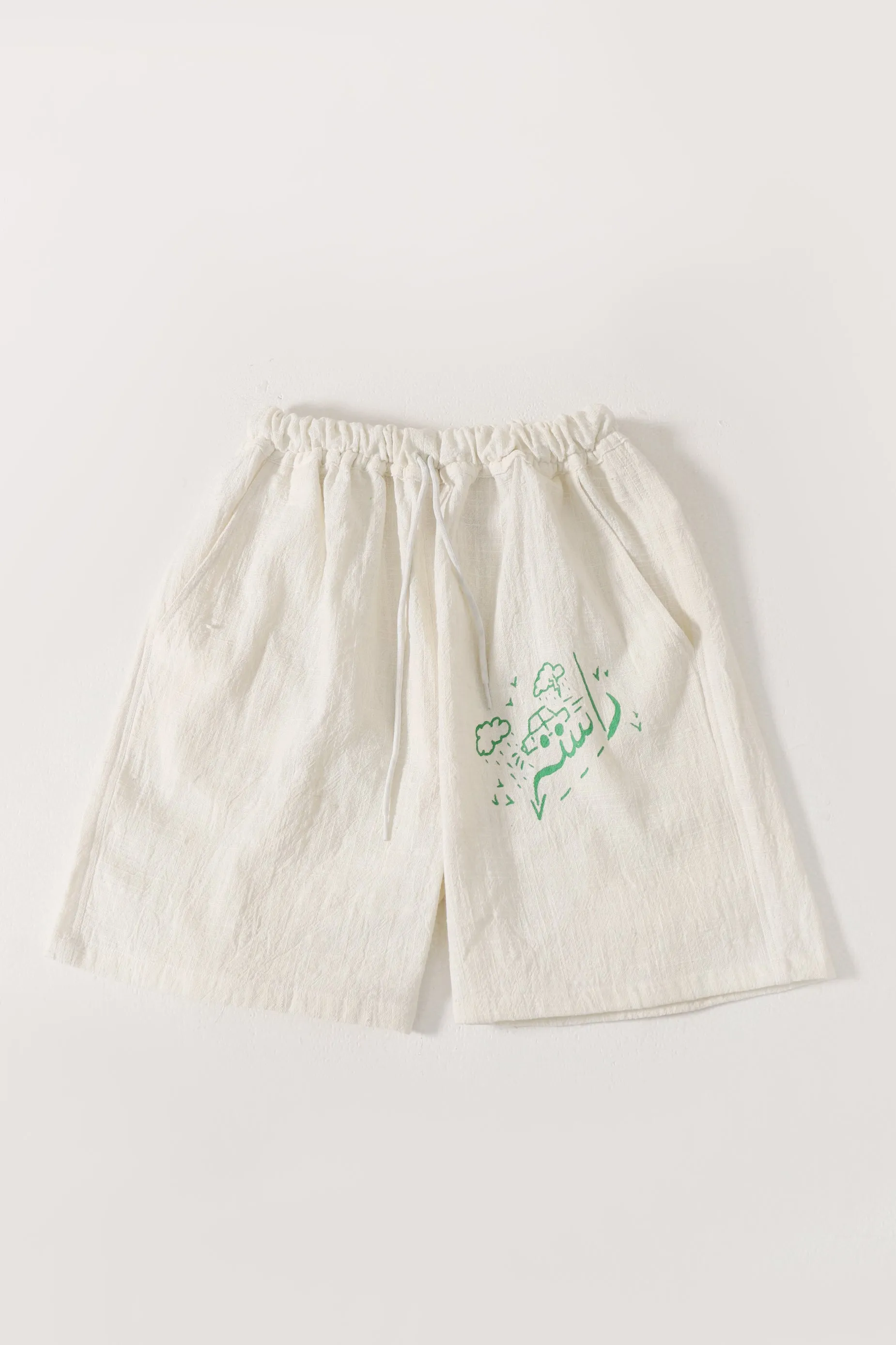 hand woven green logo shorts