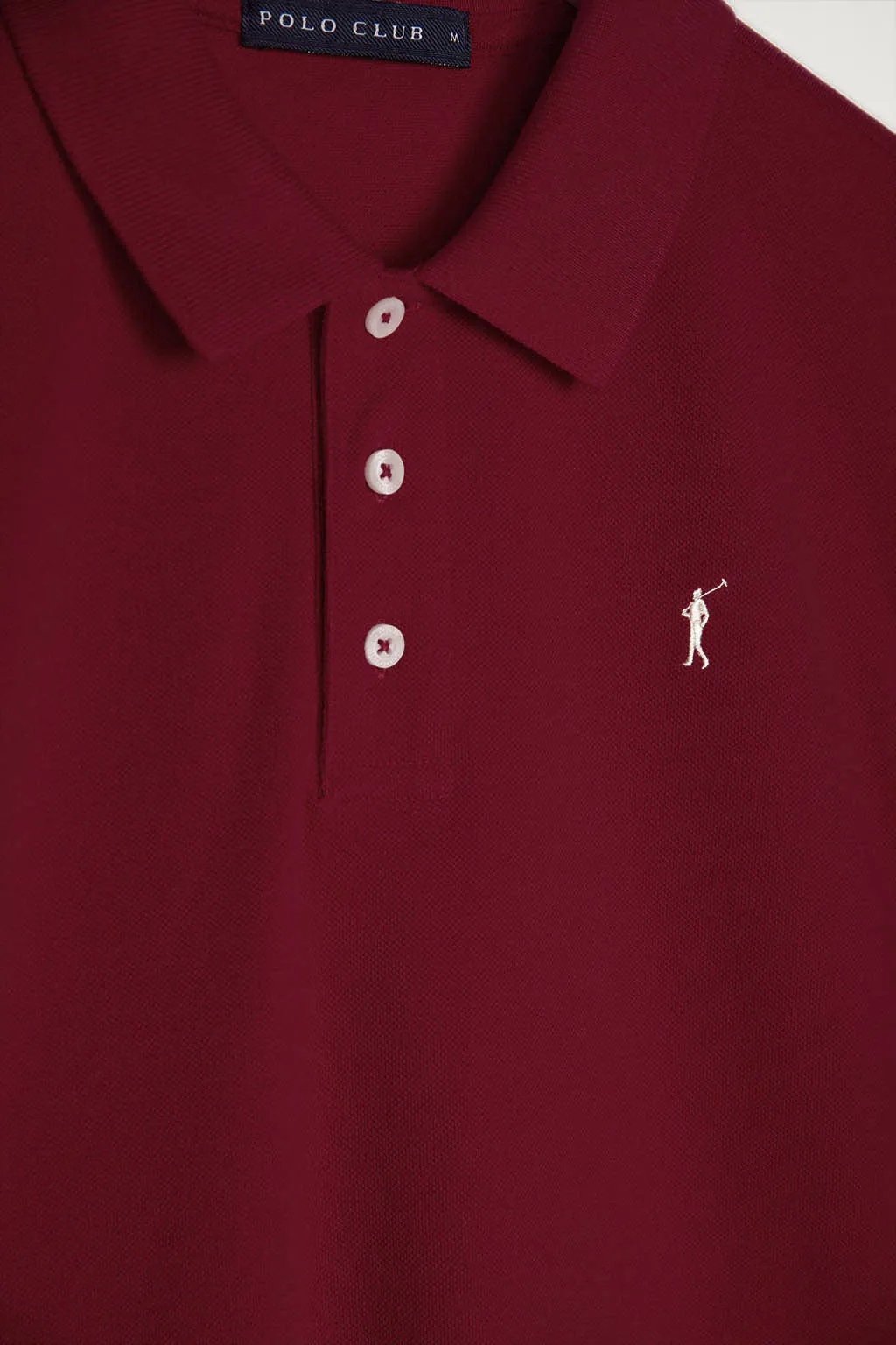 Polo burdeos piqué con tapeta de tres botones y logo bordado Rigby Go